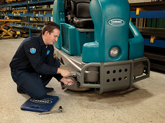 Tennant warranty maintenance on floor cleaning equipment