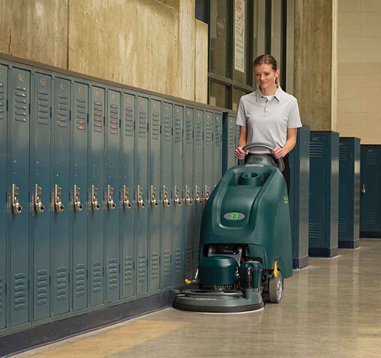 Nobles scrubber cleaning a school.